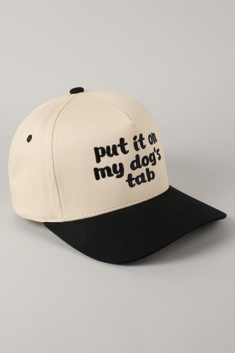 Put It On My Dog's Tab Embroidered Trucker Hat (black)