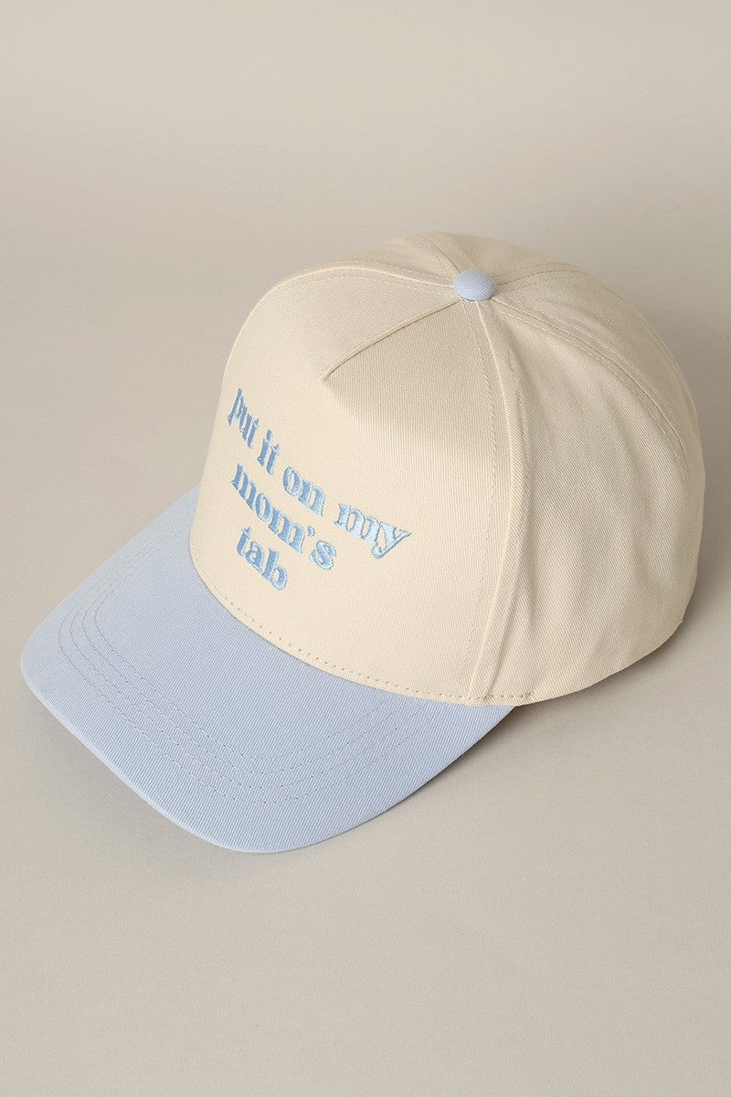 Put It On My Mom's Tab Embroidered Trucker Hat (light blue)