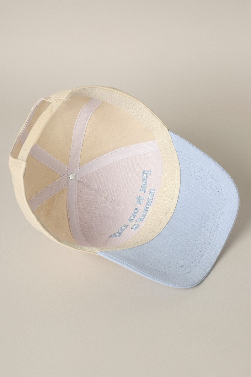 Put It On My Mom's Tab Embroidered Trucker Hat (light blue)