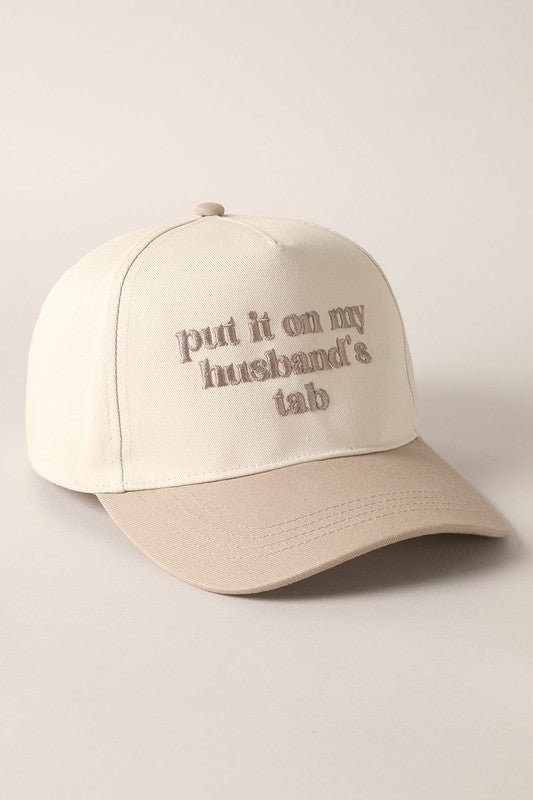 Put It On My Husband's Tab Embroidered Trucker Hat (beige)