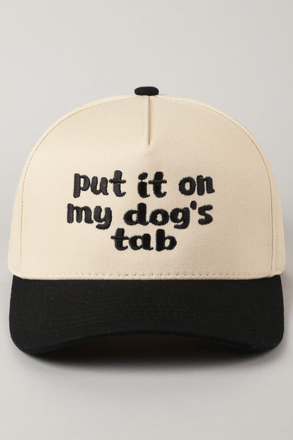 Put It On My Dog's Tab Embroidered Trucker Hat (black)