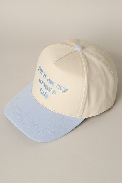 Put It On My Mom's Tab Embroidered Trucker Hat (light blue)