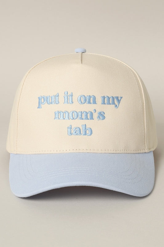 Put It On My Mom's Tab Embroidered Trucker Hat (light blue)