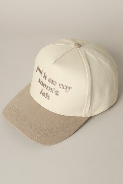 Put It On My Mom's Tab Embroidered Trucker Hat (beige)